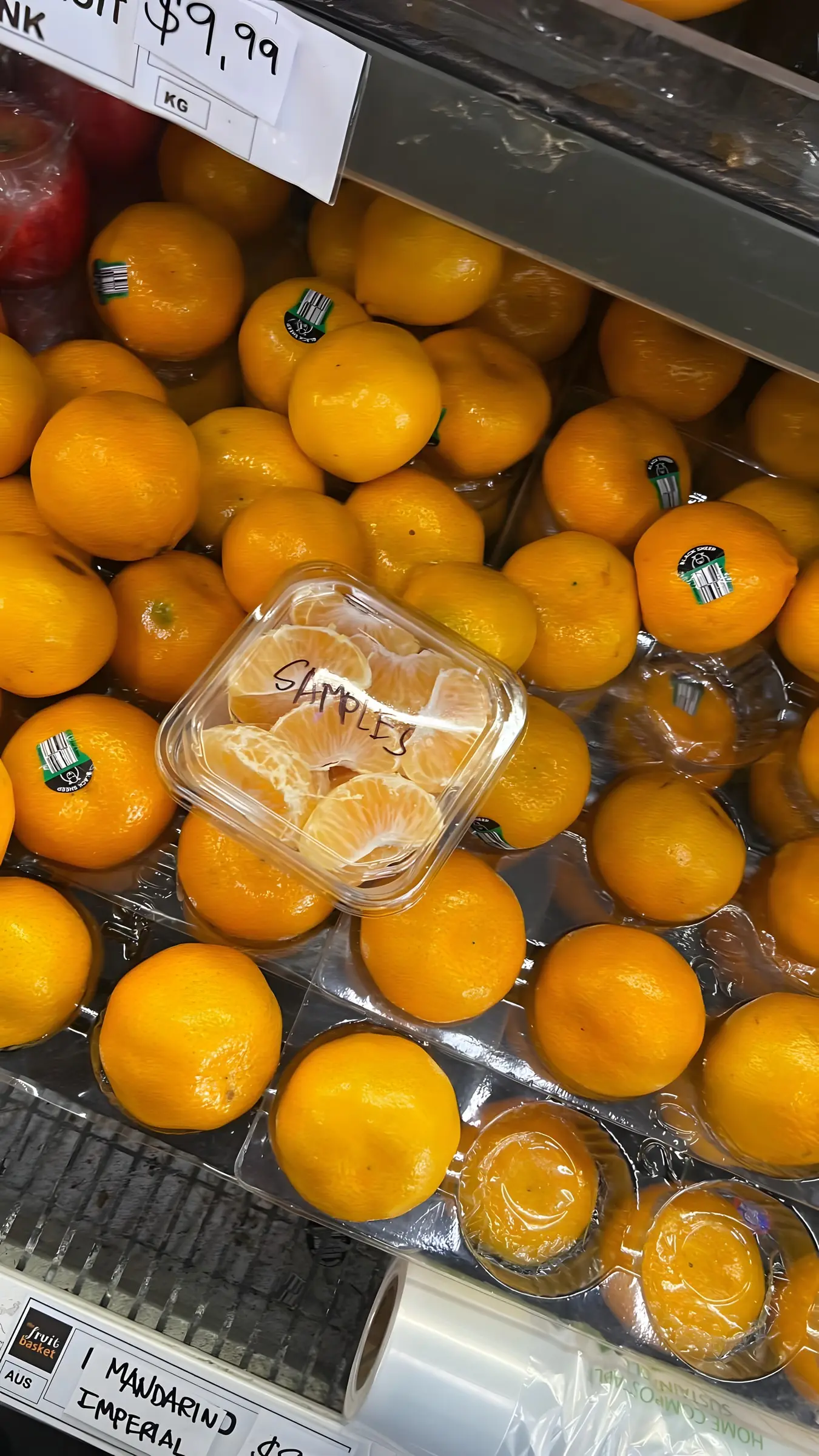 Fresh mandarins and citrus alongside juices and preserved goods