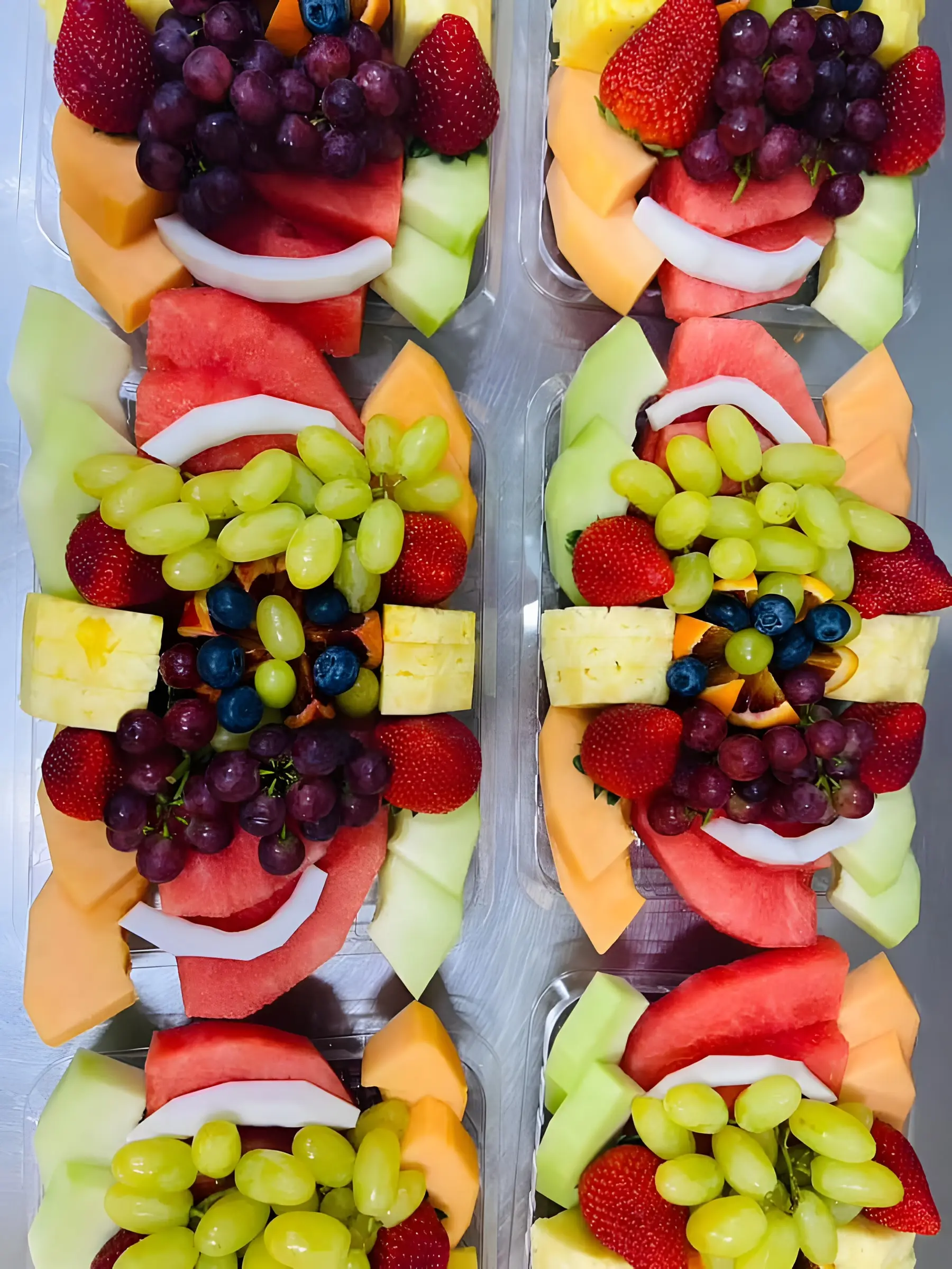 Fresh fruit platter boxes prepared by The Fruit Basket
