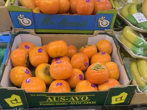 Fuyu persimmons at The Fruit Basket