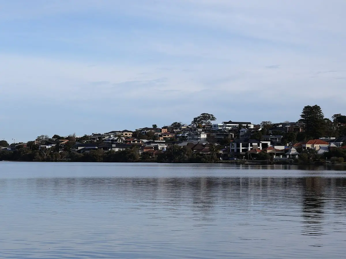 Mount Pleasant's riverside homes seen across the Canning River from Deep Water Point